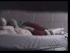 A wife's nighttime masturbation by her lover is seen on hidden camera.